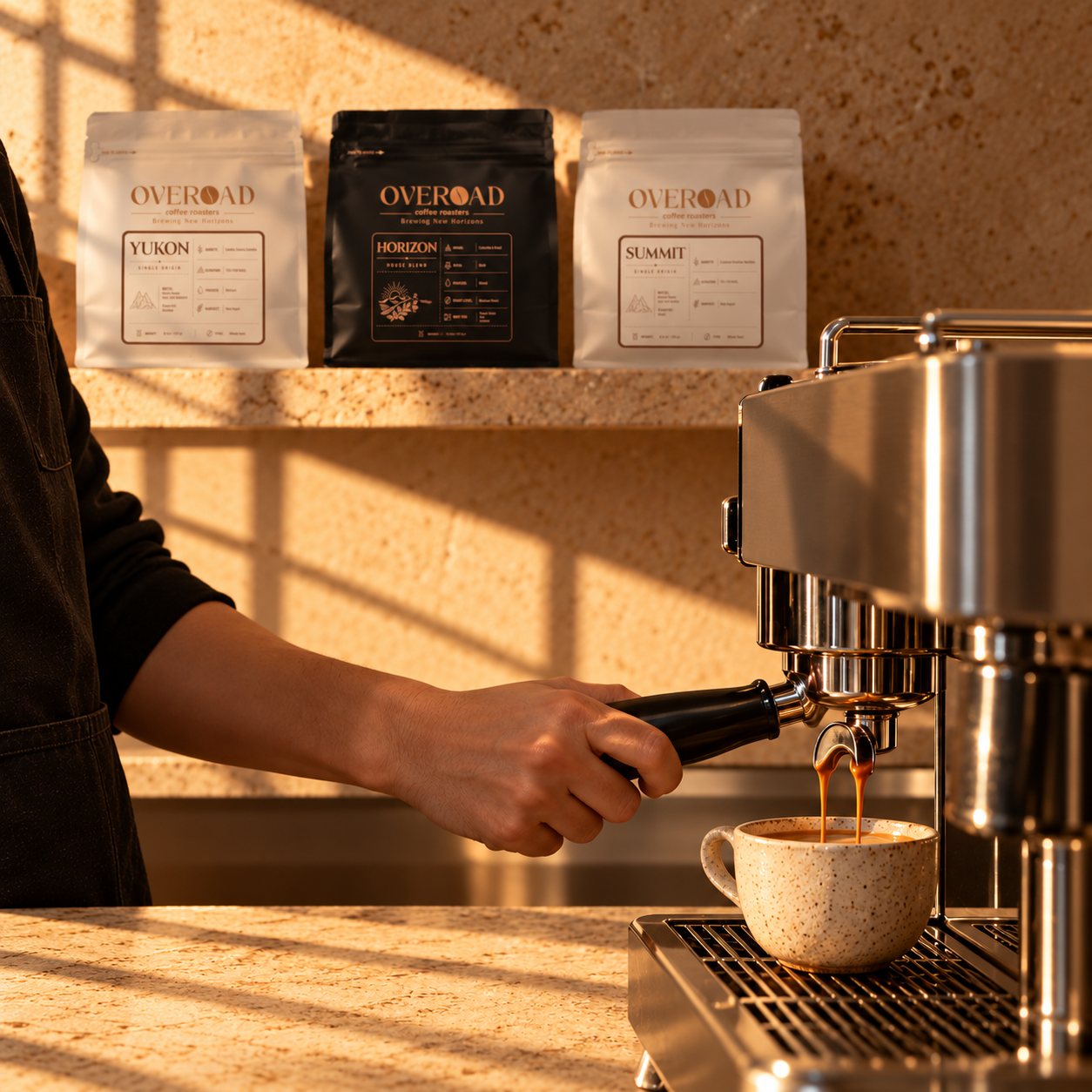 Barista pulling an espresso shot beneath a shelf of OVEROAD bags